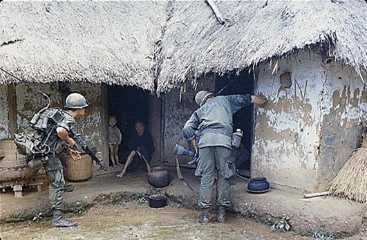 http://www.fasttrackteaching.com/burns/Unit_11_Cold_War/Vietnam_US_soldiers_searching_1966_dbna_s.gif
