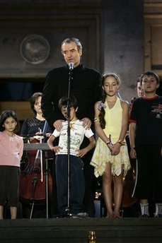 Renowned Russian conductor, centre, Valery Gergiev speaks before ...
