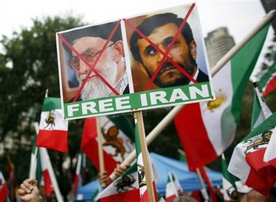 Demonstrators rally against Iranian President Mahmoud Ahmadinejad ...
