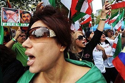 Protesters shout slogans during a demonstration against Iran&#39;s ...