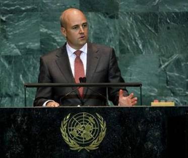 Sweden&#39;s Prime Minister Fredrik Reinfeldt addresses the ...